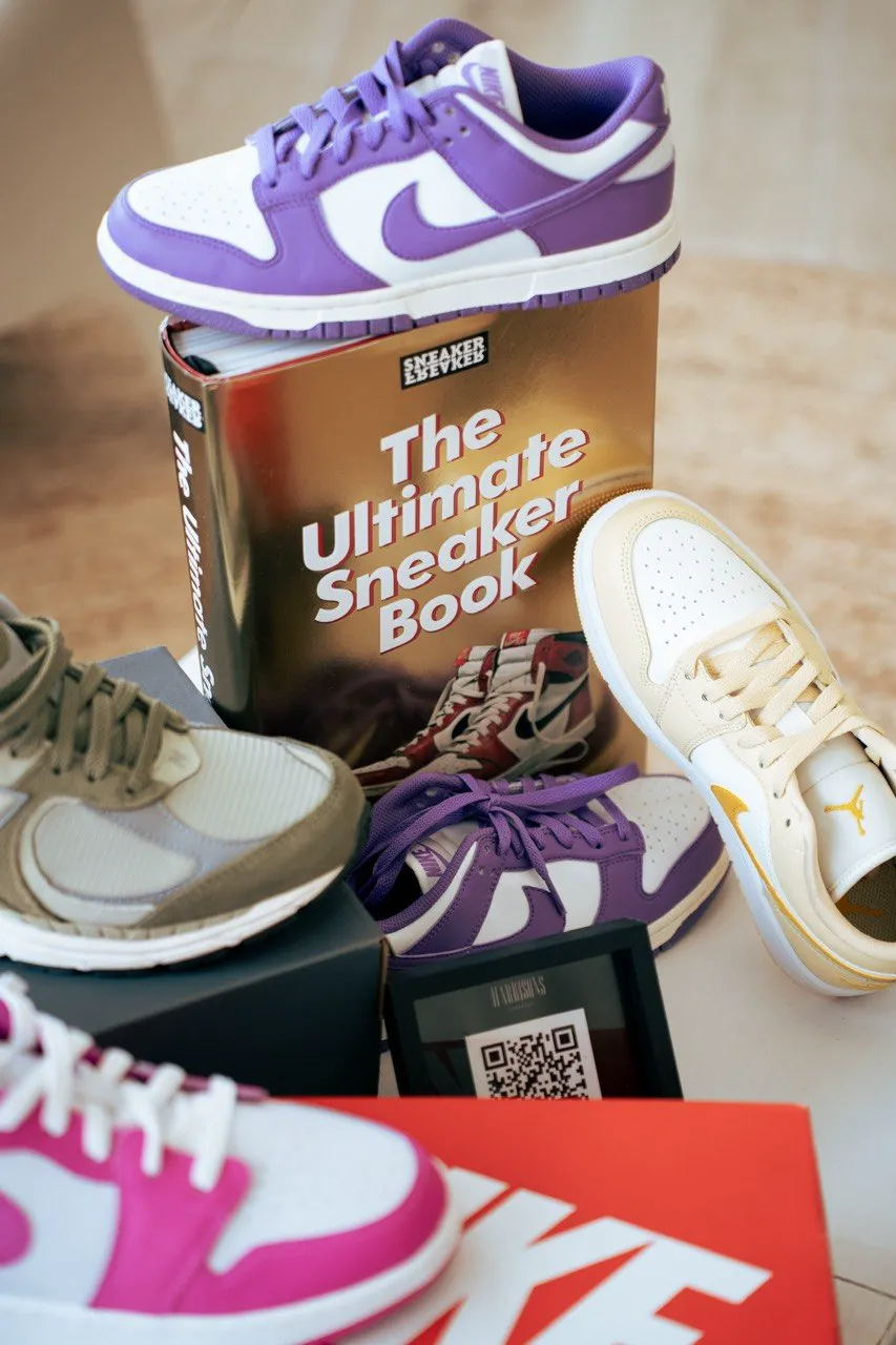 Nike Dunks and Jordans stacked around The Ultimate Sneaker Book with the Harrisons QR frame
