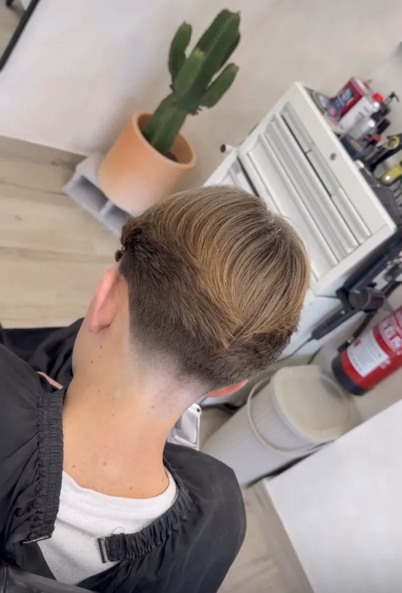 Classic side part with a tidy taper at Harrisons